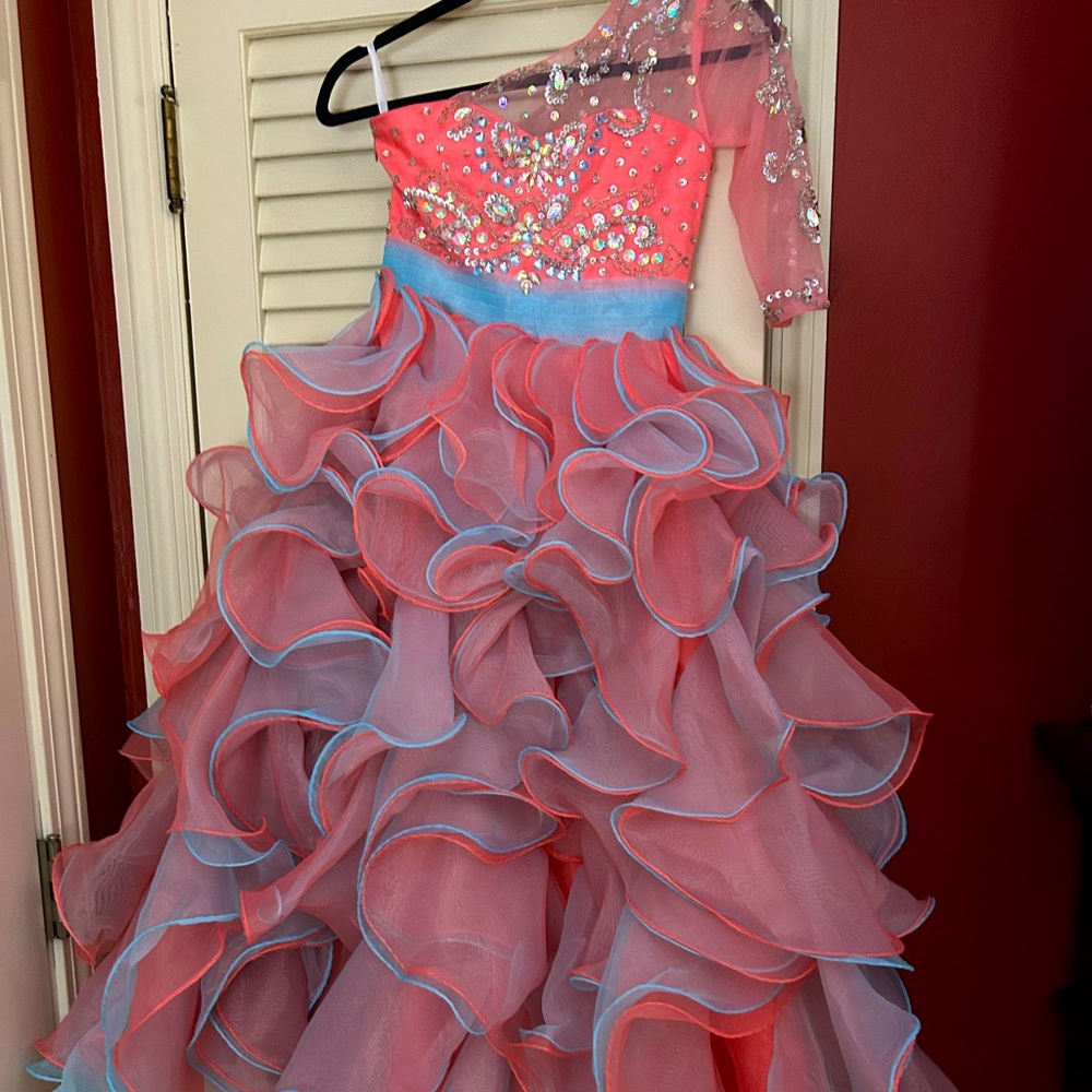 Size 8 pageant dress. No longer in stock! Never worn! Unique